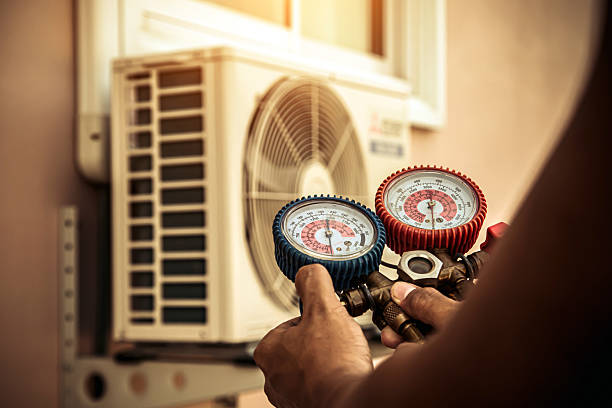 Professional Hvac technician working in Echola, AL